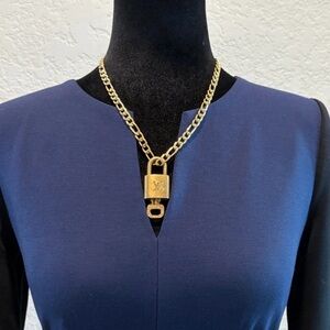 Louis Vuitton #315
Lock and Key W/ Gold Chain